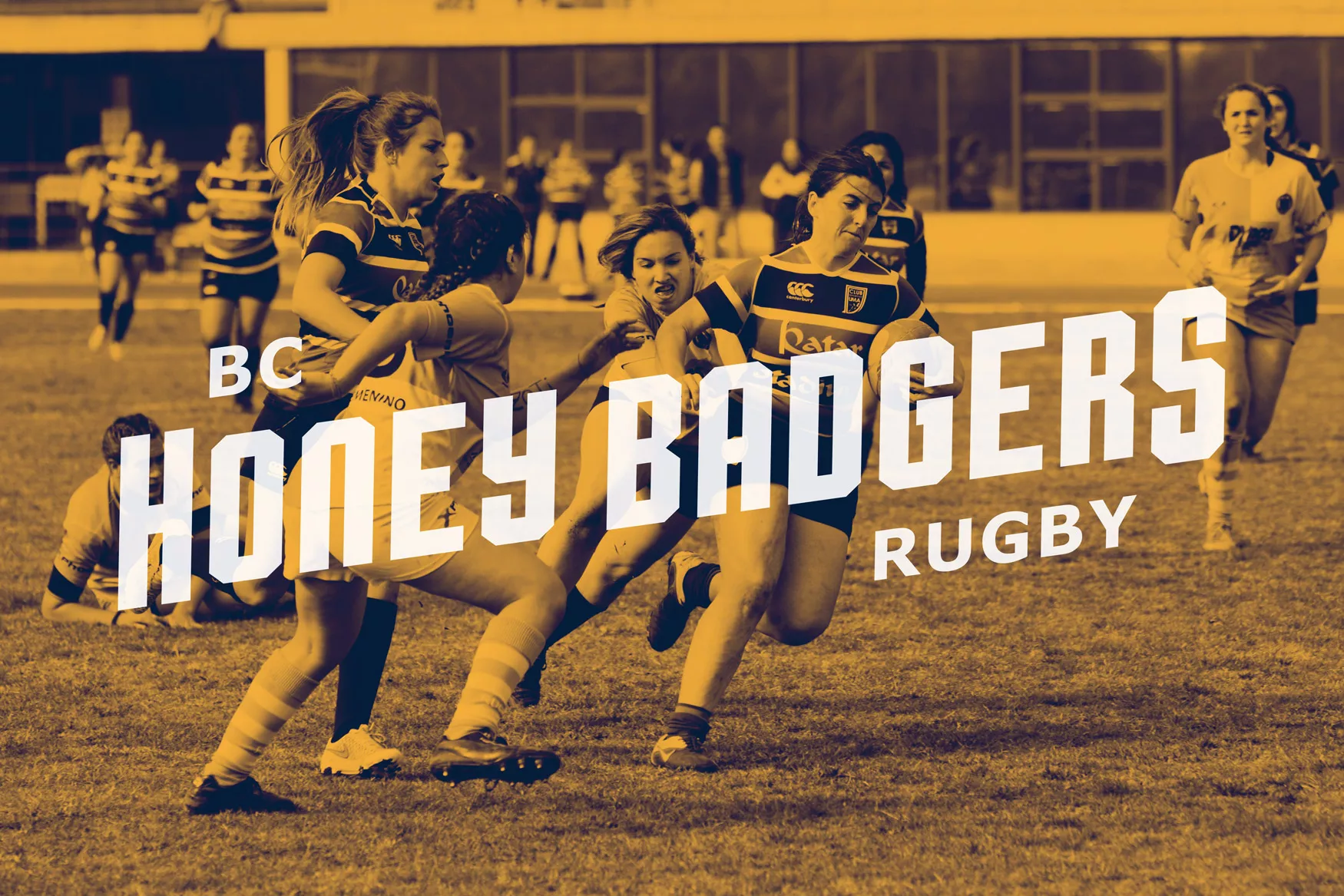 women playing rugby on the field